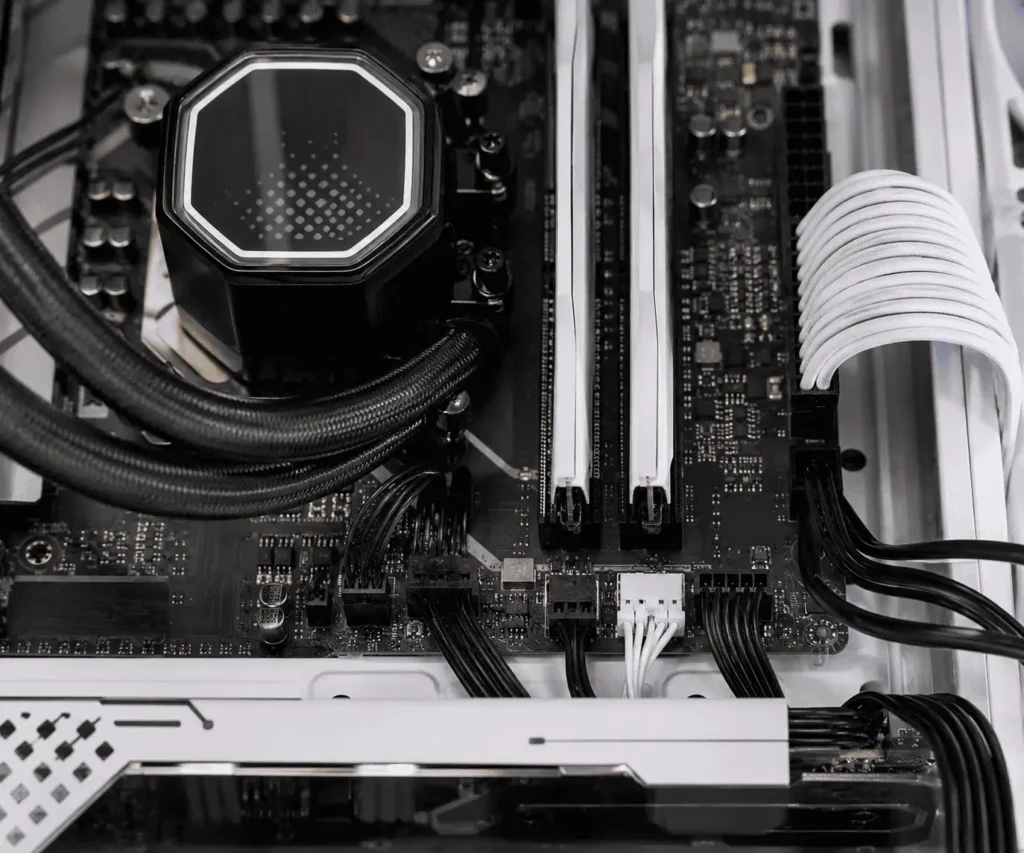 AIO pump and radiator fan cables connected to motherboard headers